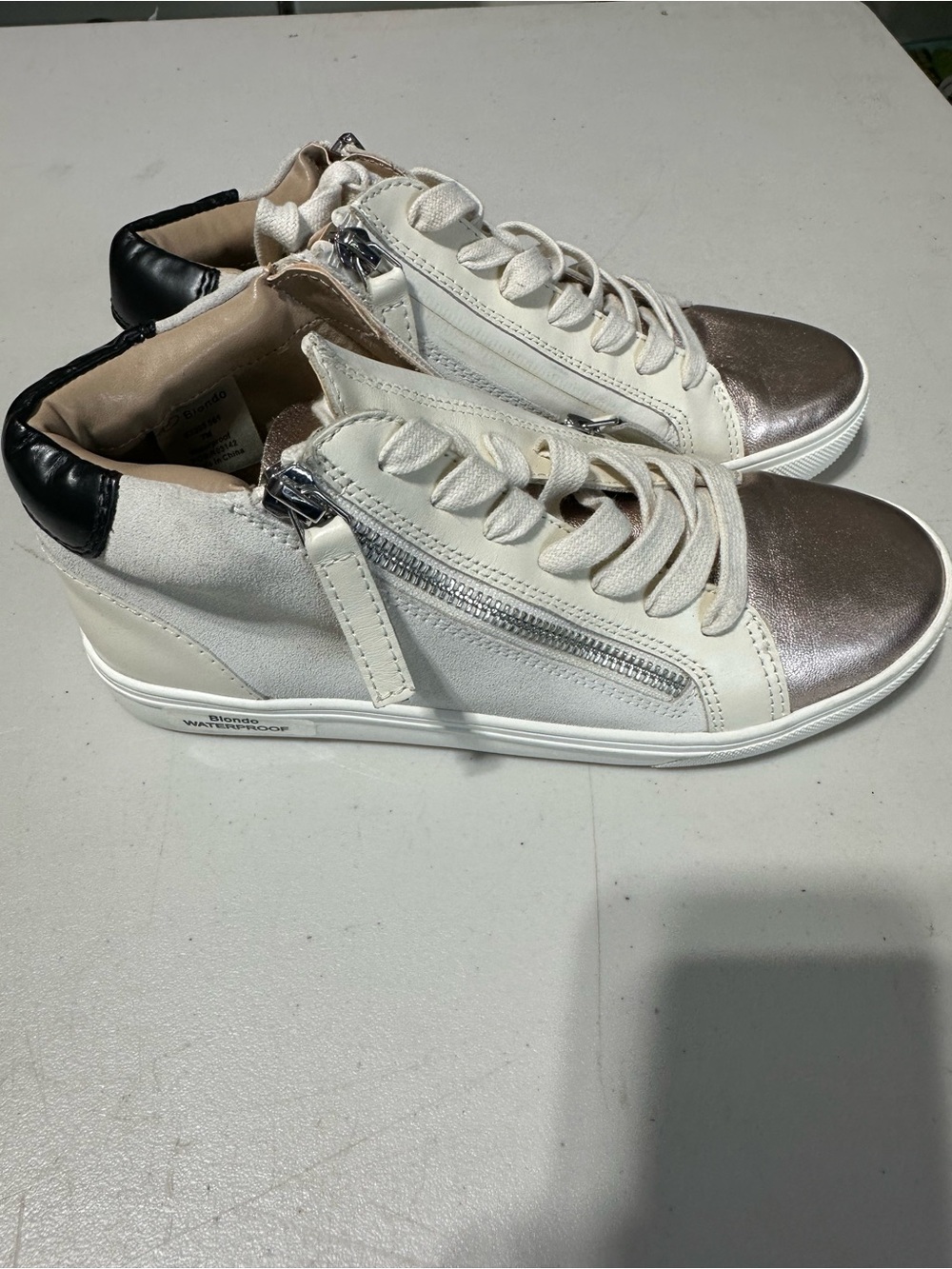 Blondo Women’s White Sneakers with Metallic Silver Toe and Black Heel